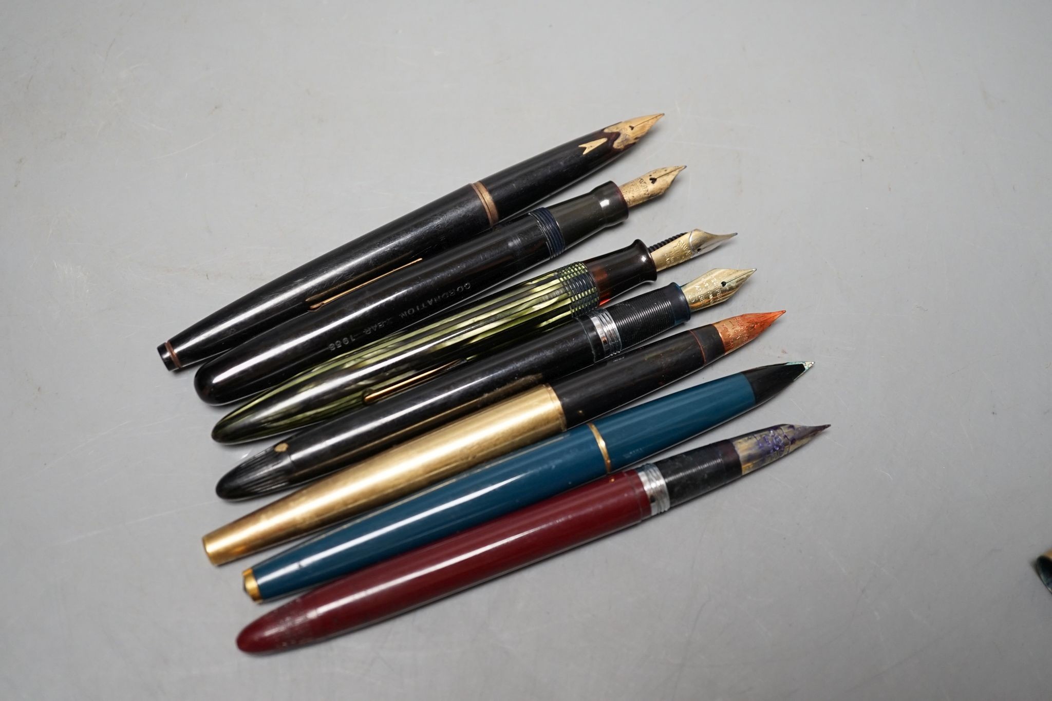 Seven assorted pens including fountain pen with 18ct gold nib.